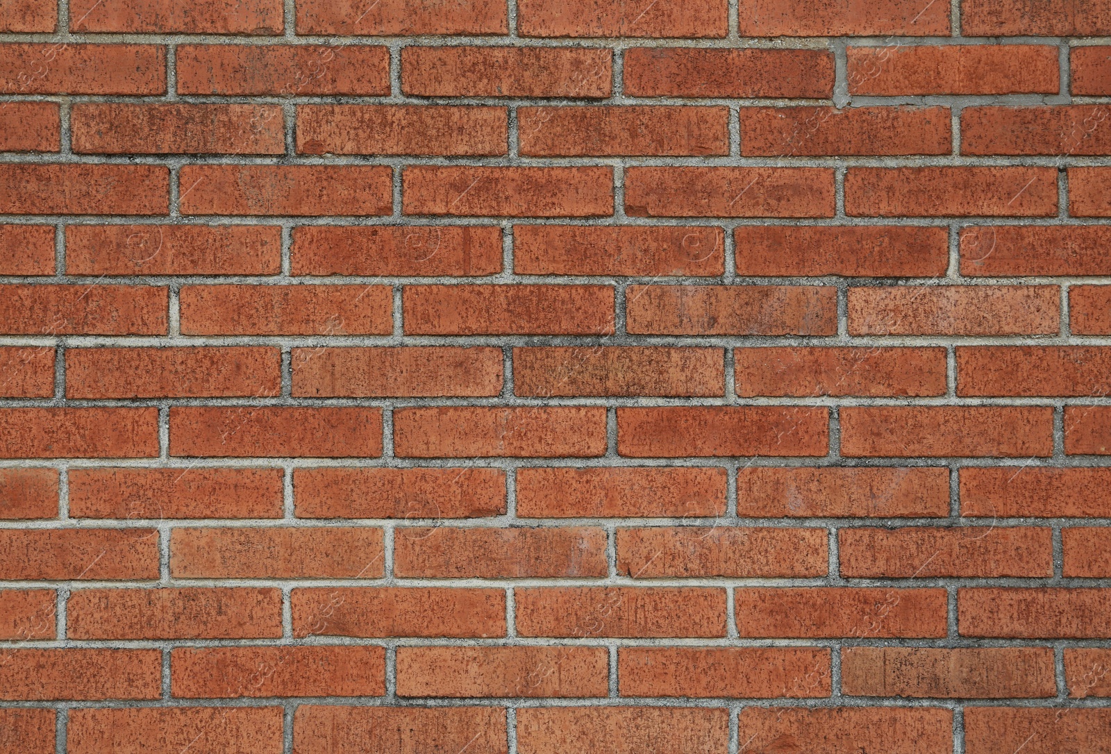 Photo of Texture of beautiful red brick stone wall as background