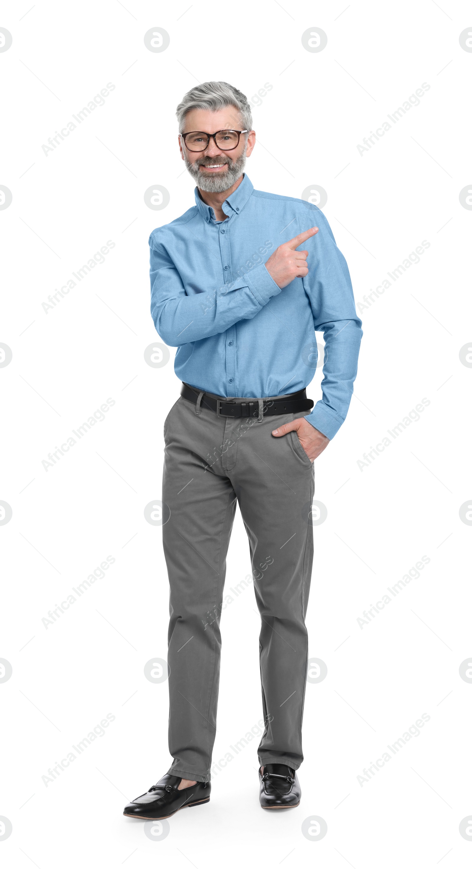 Photo of Mature businessman in stylish clothes posing on white background