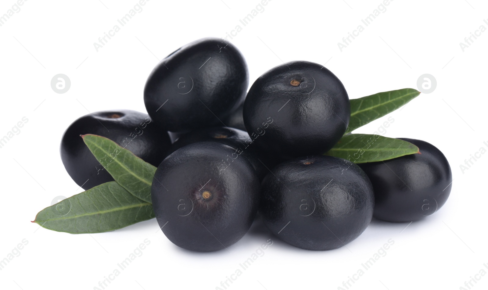 Photo of Pile of fresh ripe acai berries and green leaves on white background
