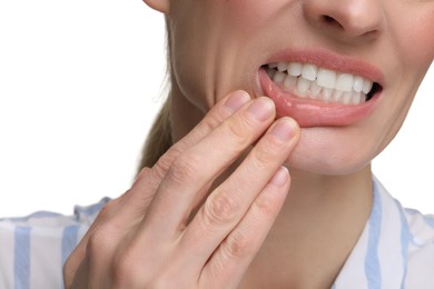 Photo of Woman showing her clean teeth on white background, closeup