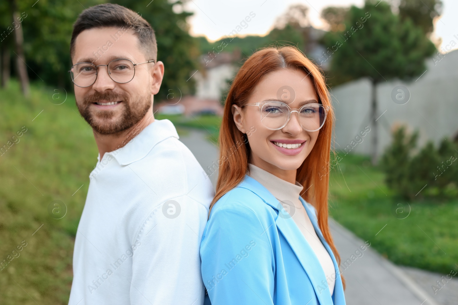 Photo of Portrait of happy couple in glasses outdoors