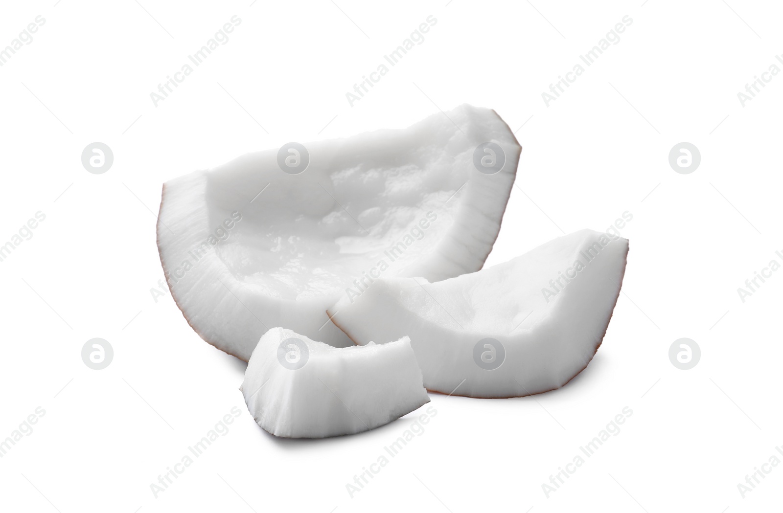 Photo of Pieces of tasty ripe coconut on white background