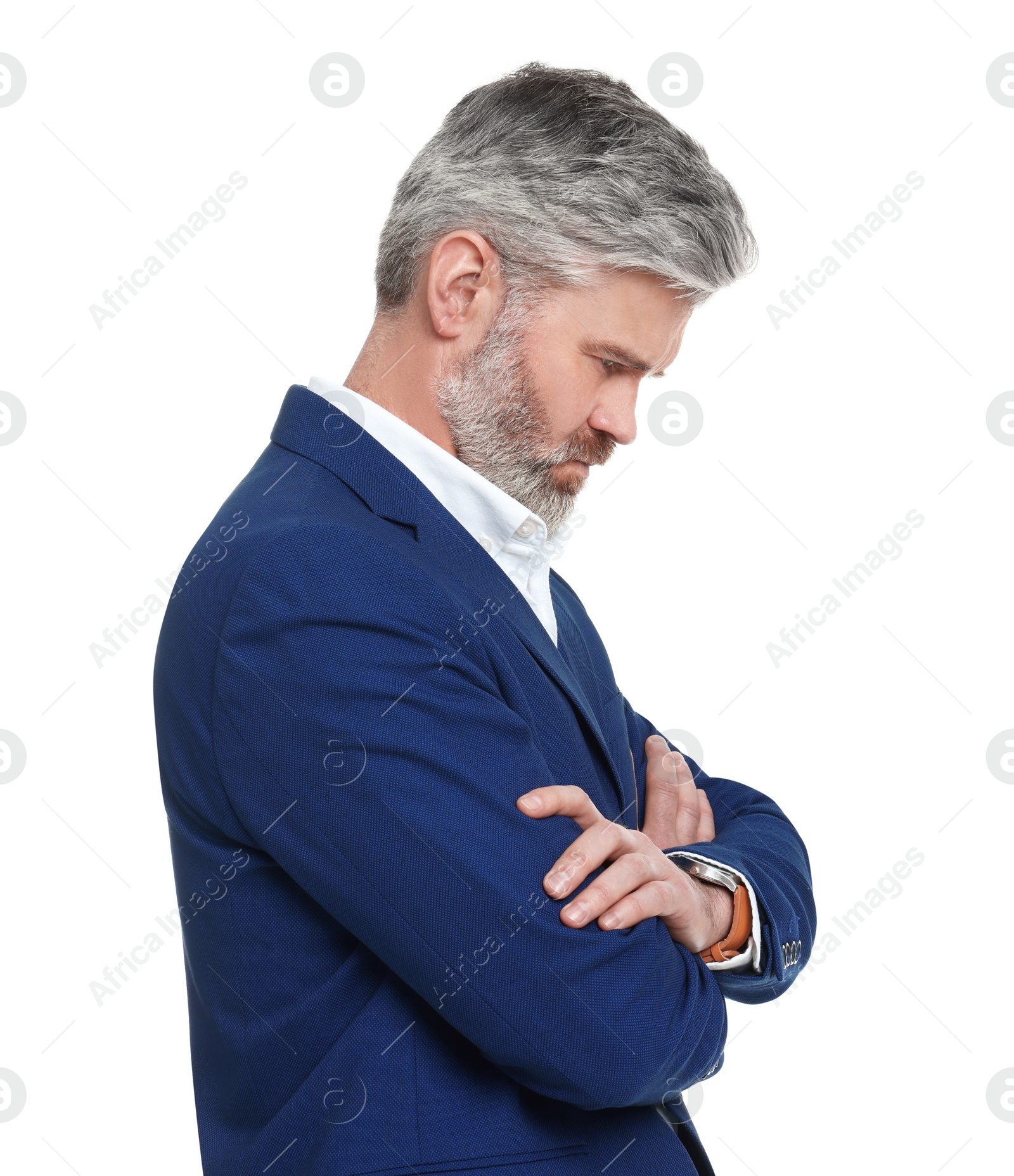 Photo of Mature businessman in stylish clothes posing on white background