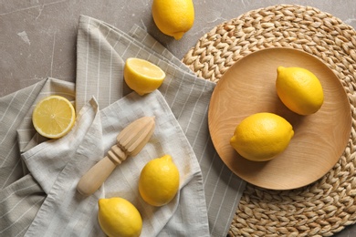 Photo of Flat lay composition with lemons on color background