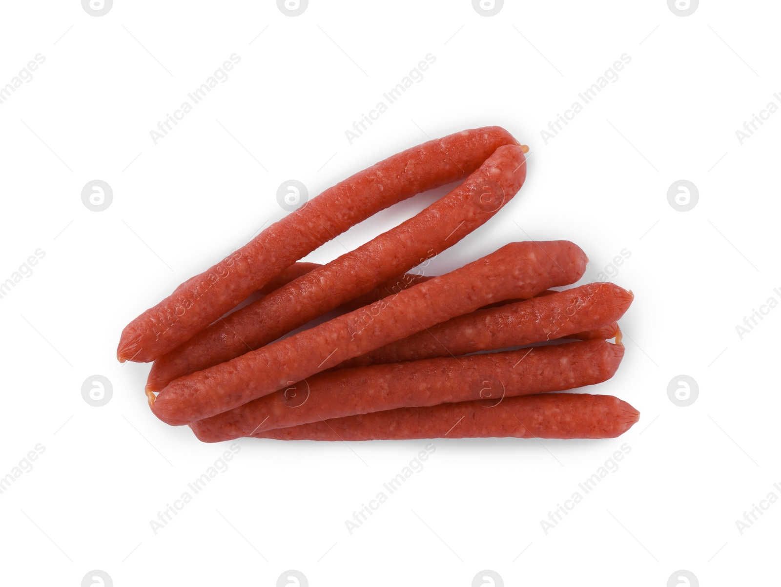 Photo of Thin dry smoked sausages isolated on white, top view