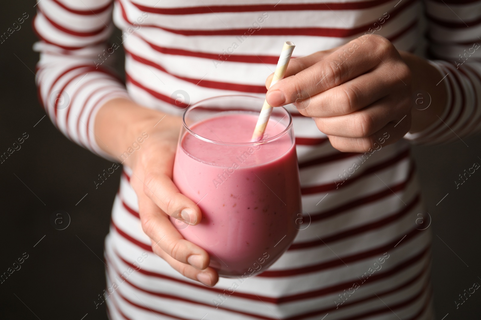 Image of Woman with glass of tasty smoothie, closeup