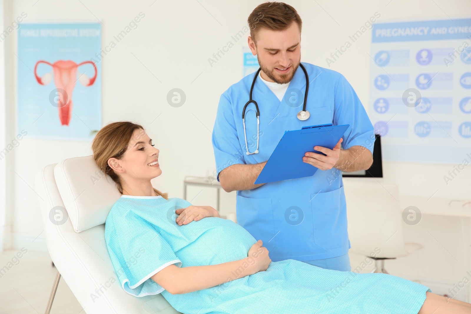 Photo of Gynecology consultation. Pregnant woman with her doctor in clinic
