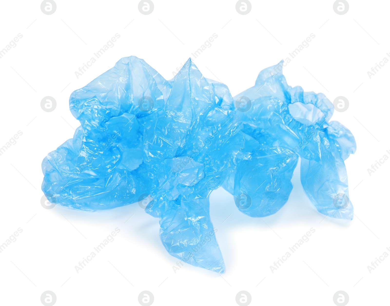 Photo of Medical blue shoe covers on white background