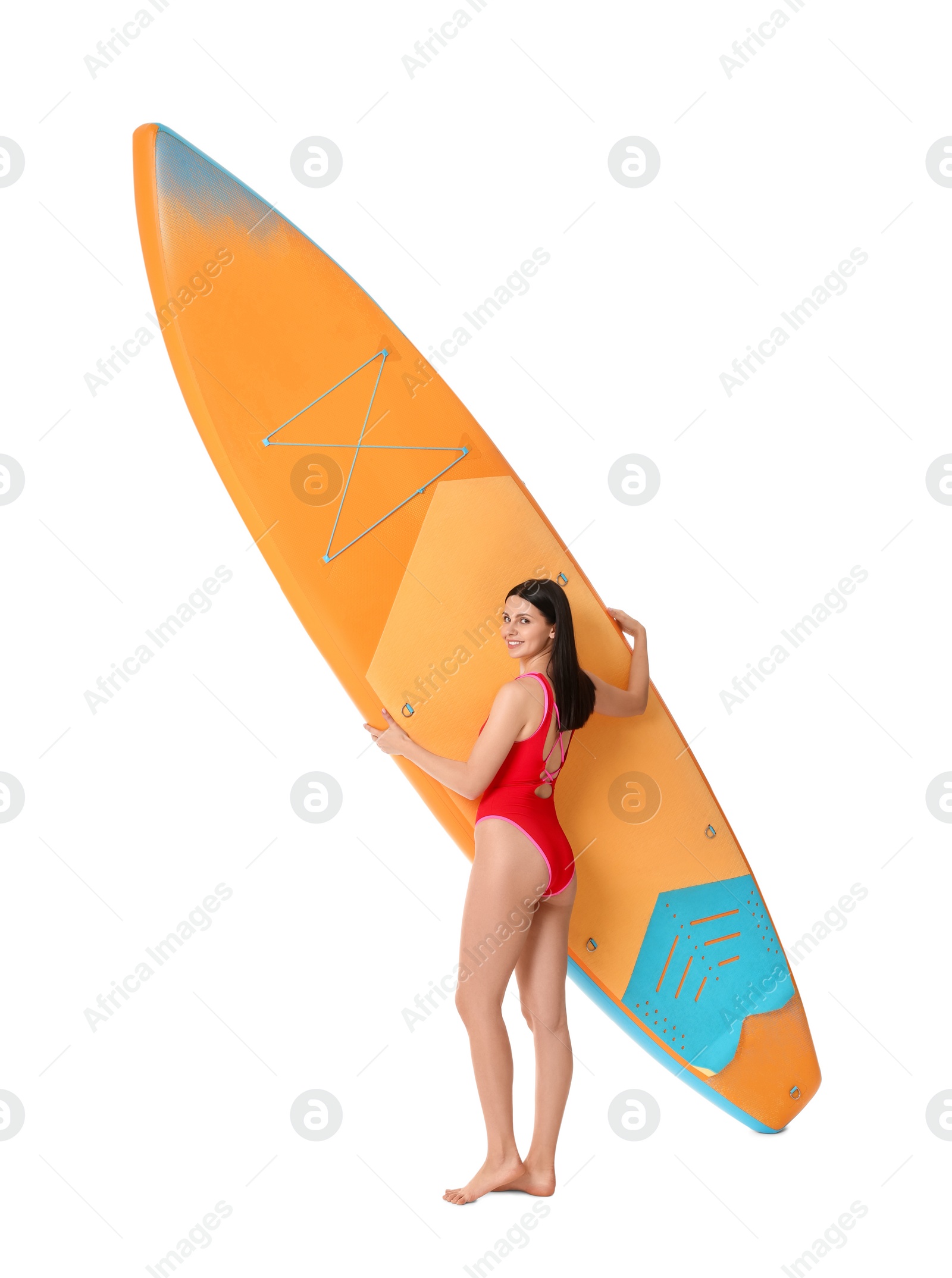 Photo of Happy woman with orange SUP board on white background