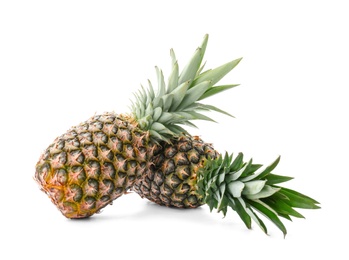 Photo of Fresh pineapples on white background