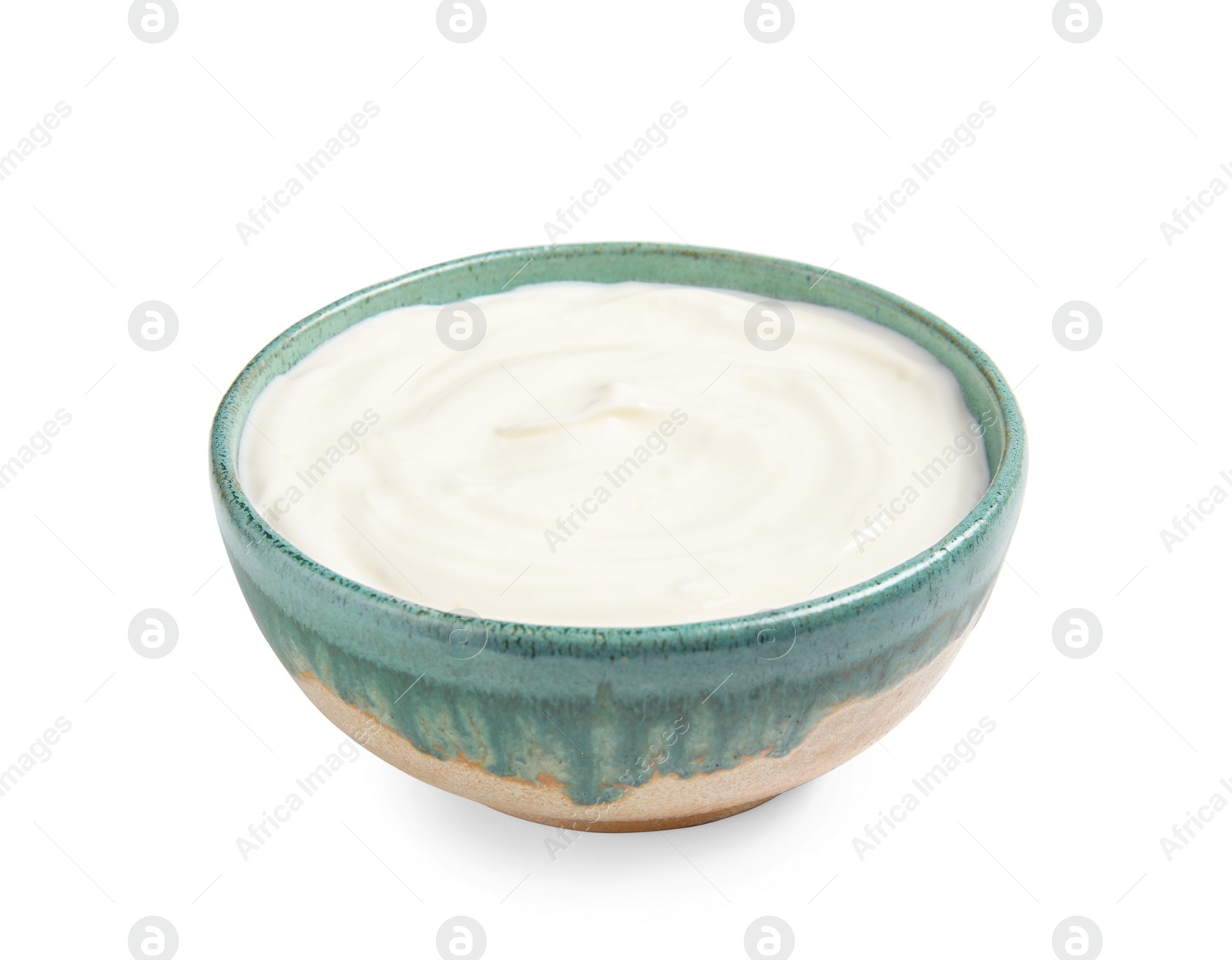 Photo of Bowl with creamy yogurt on white background