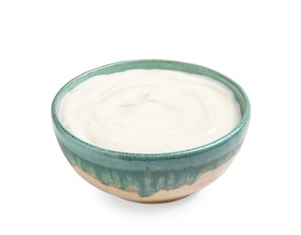 Bowl with creamy yogurt on white background