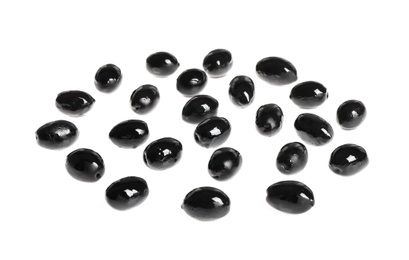 Photo of Tasty black olives on white background. Layer for pizza