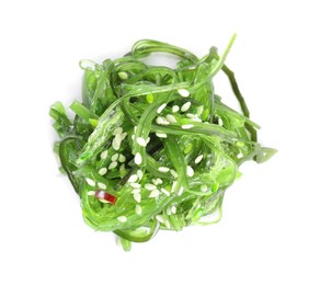 Photo of Delicious seaweed salad on white background, top view