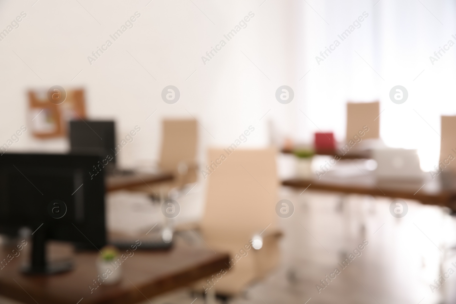 Photo of Modern brightly lit office with bokeh effect