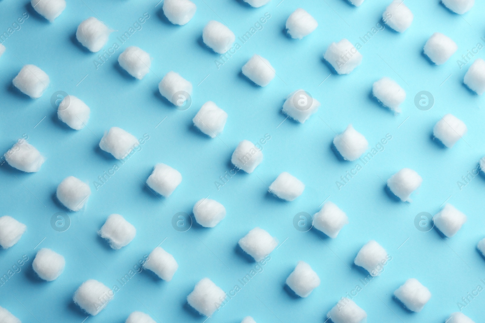 Photo of Flat lay composition with cotton balls on color background