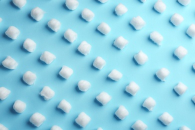 Photo of Flat lay composition with cotton balls on color background