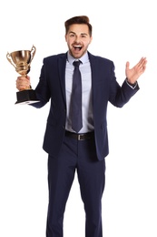 Photo of Portrait of happy young businessman with gold trophy cup on white background
