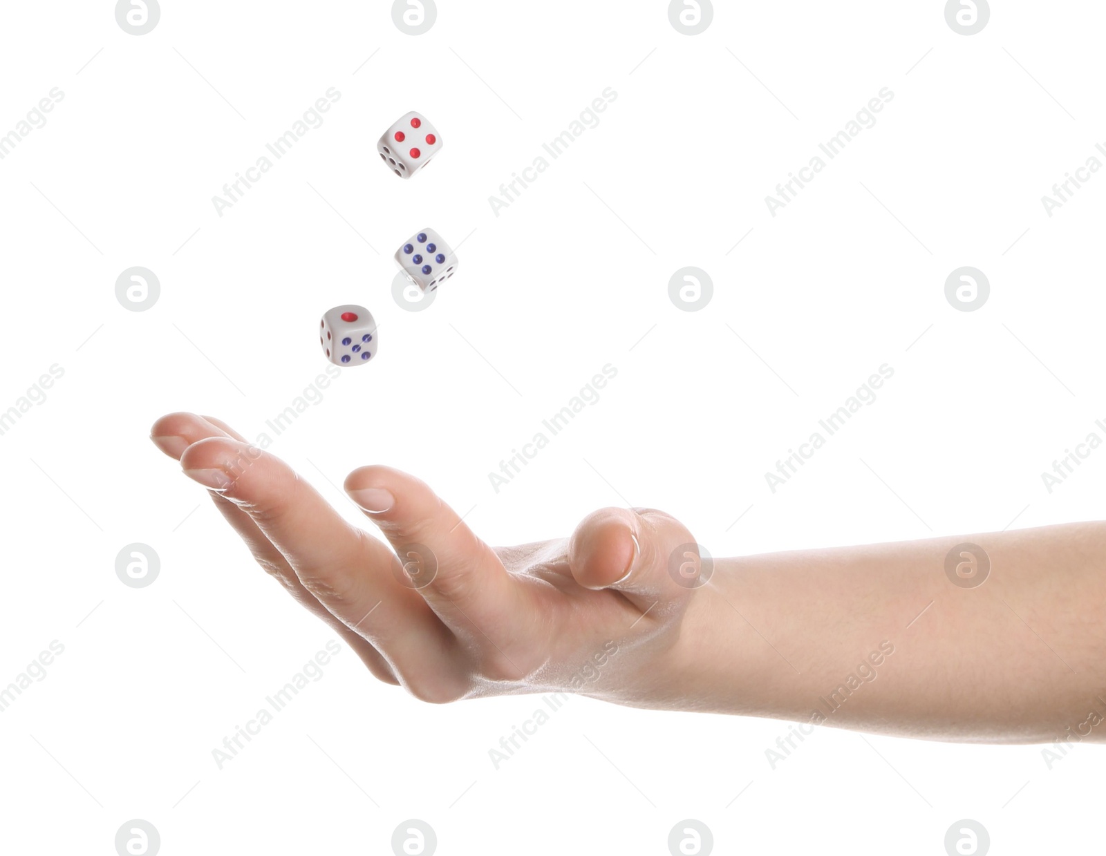 Photo of Woman throwing game dices on white background, closeup