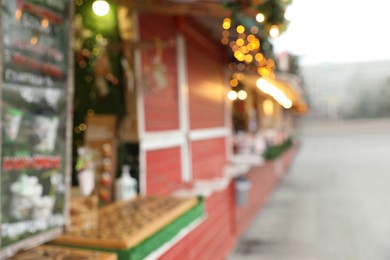 Blurred view of Christmas fair stalls outdoors