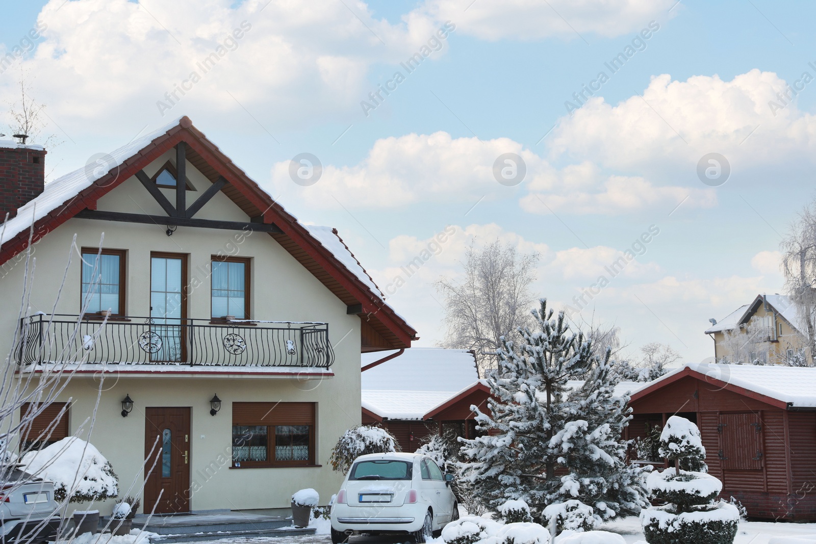 Photo of Winter landscape with modern house, trees and car in morning