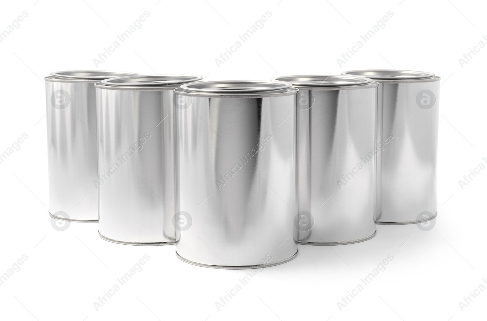 Photo of Many cans of paints on white background