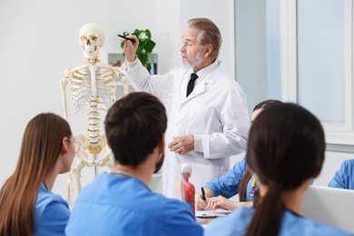 Doctor giving lecture for interns in university