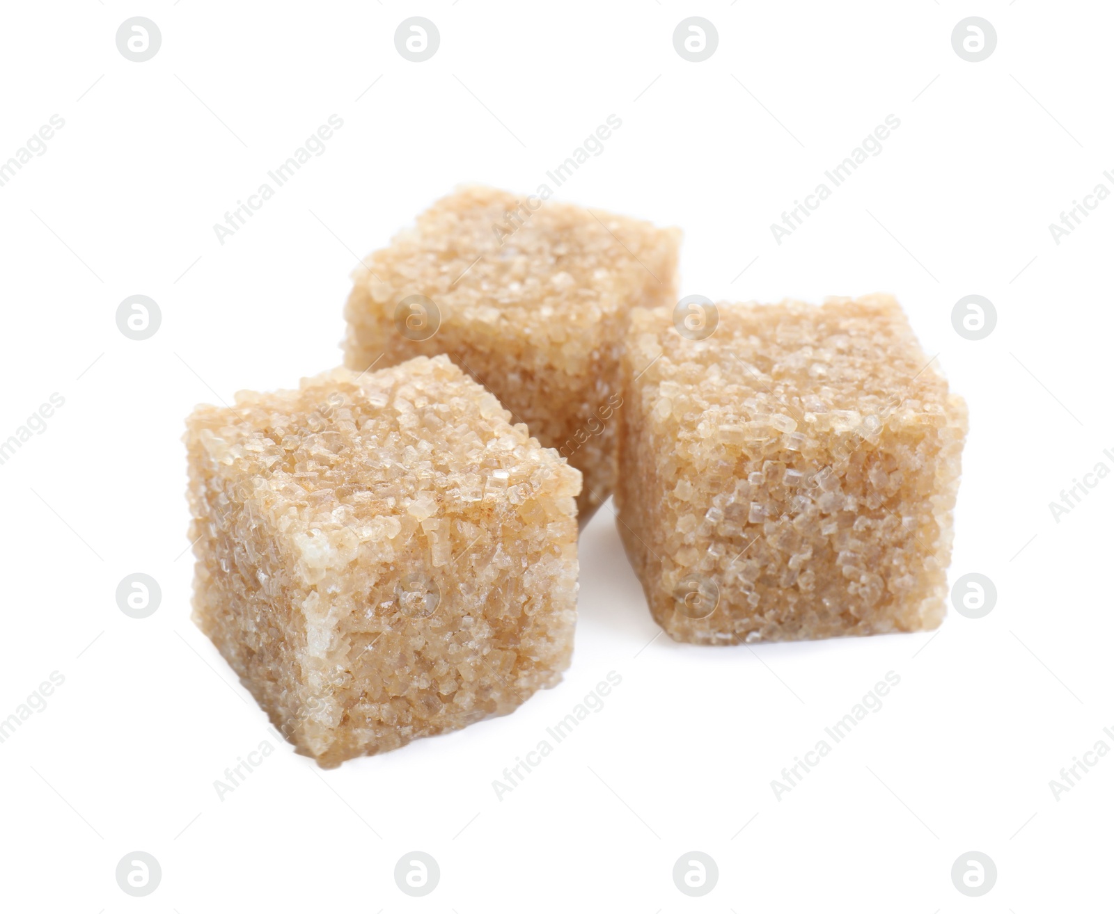 Photo of Three brown sugar cubes isolated on white