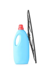 Photo of Bottle of windshield washer fluid and wiper on white background