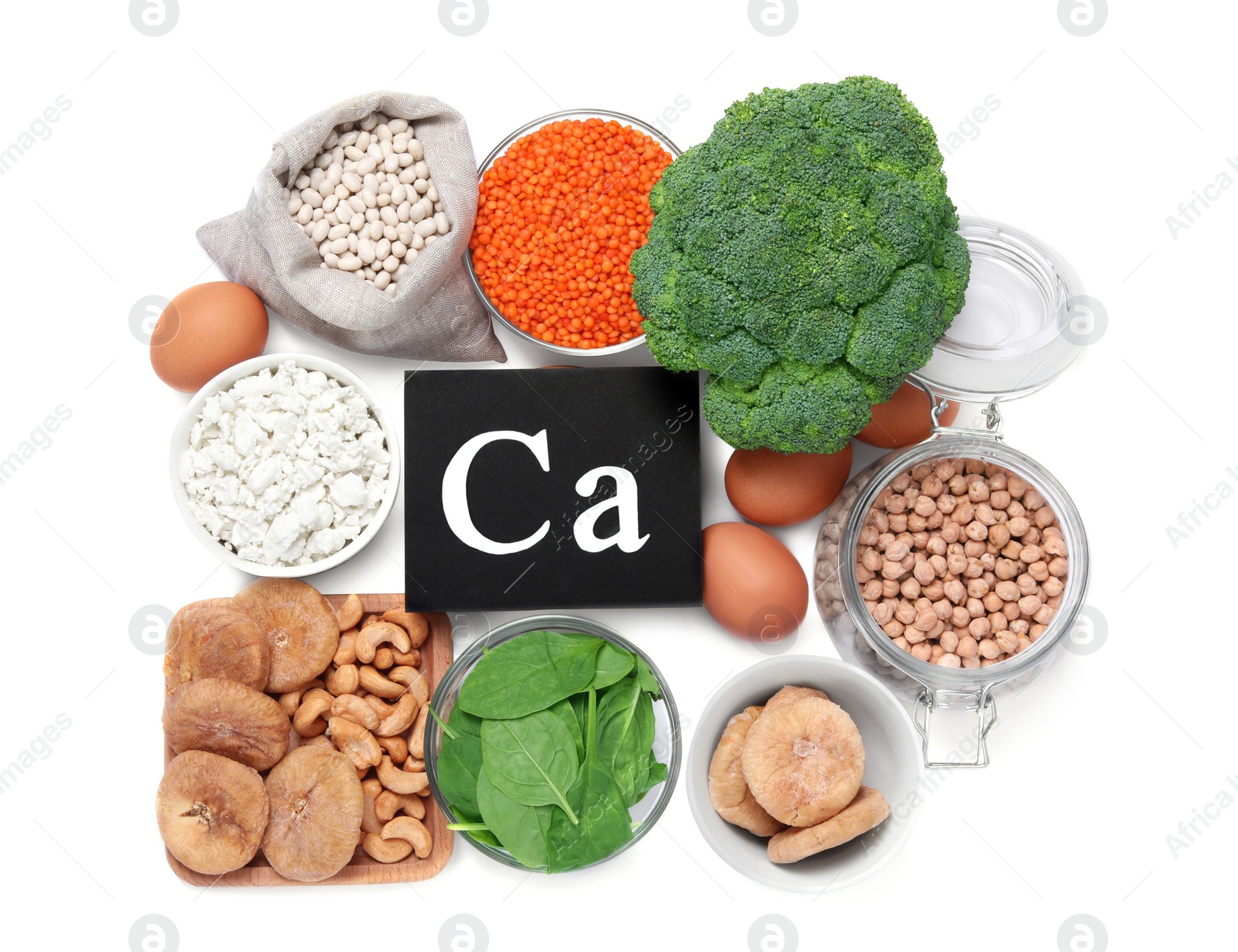 Photo of Set of natural food high in calcium on white background, top view