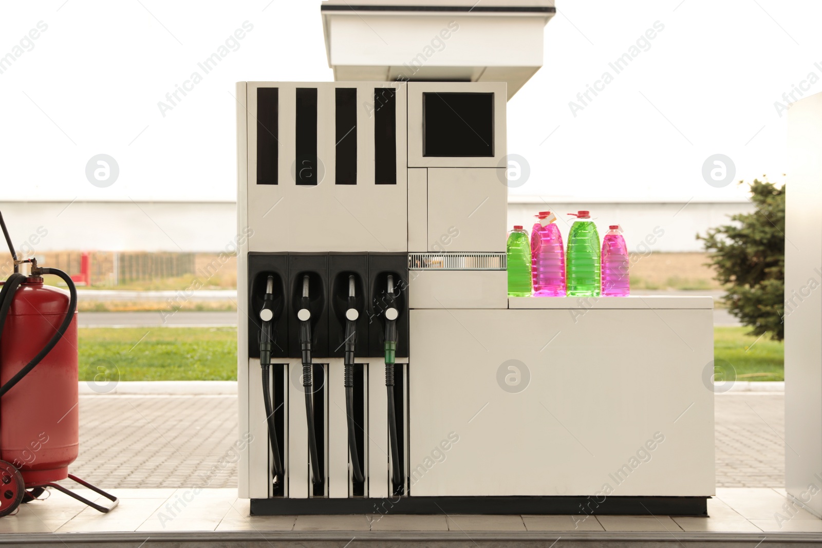 Photo of Gasoline pump at modern gas filling station