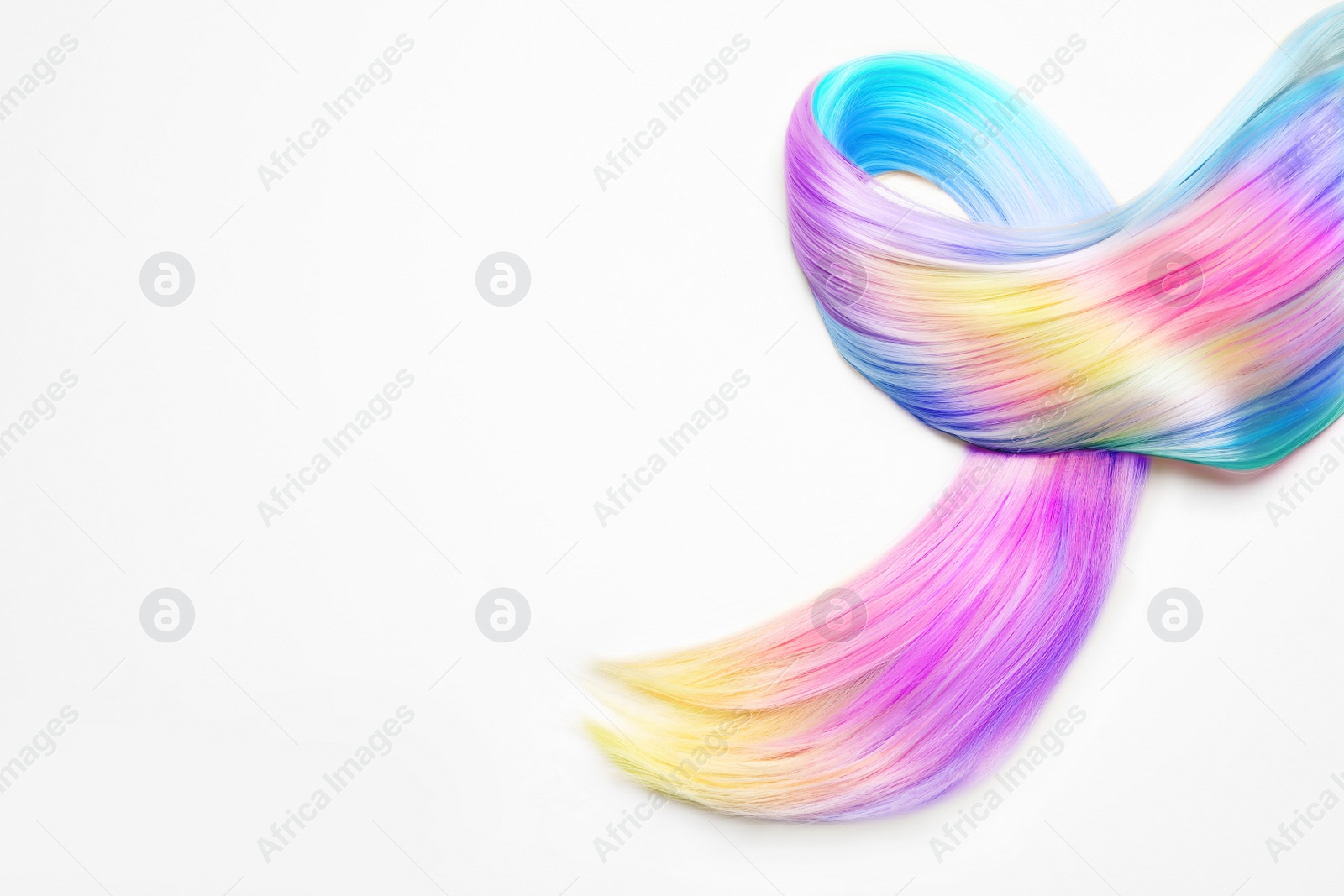 Image of Strand of beautiful multicolored hair on white background, top view