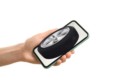 Image of Woman buying car tire from online auto store via smartphone on white background, closeup. Delivery service