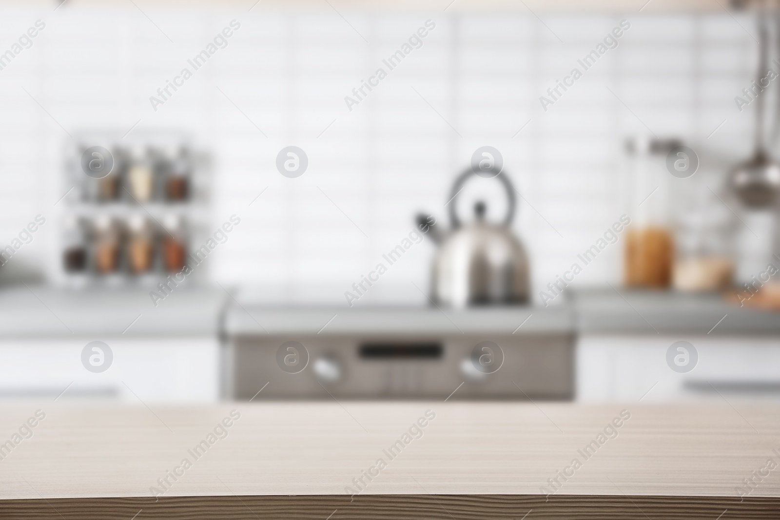 Photo of Countertop and blurred view of kitchen interior. Idea for home design