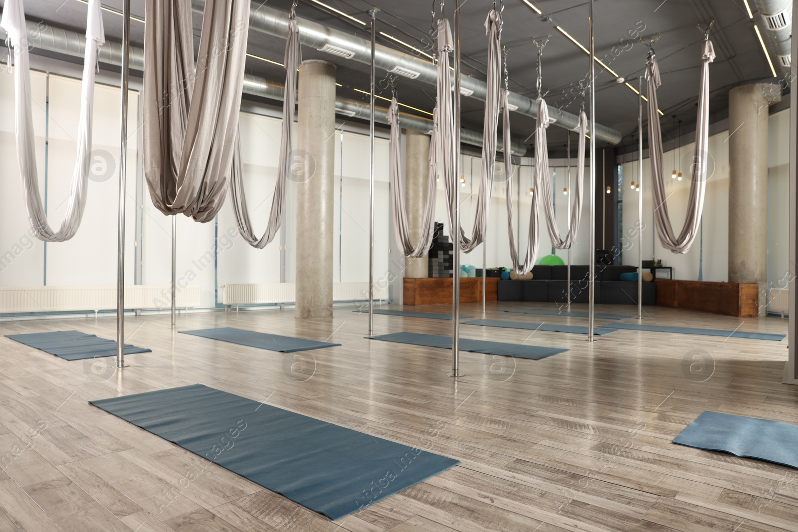 Photo of Many hammocks for fly yoga in studio