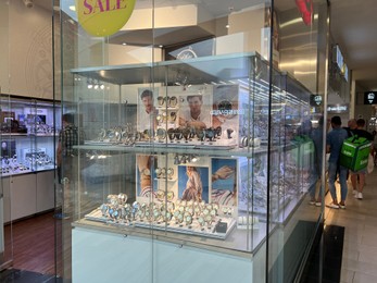 Photo of WARSAW, POLAND - JULY 13, 2022: Showcase with wrist watches in shopping mall