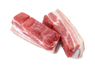 Photo of Pieces of raw pork belly isolated on white