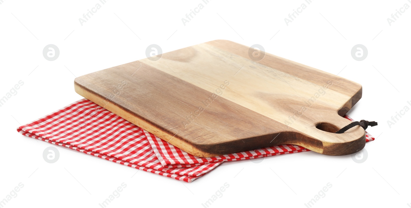 Photo of Wooden cutting board with kitchen towel isolated on white. Cooking utensil
