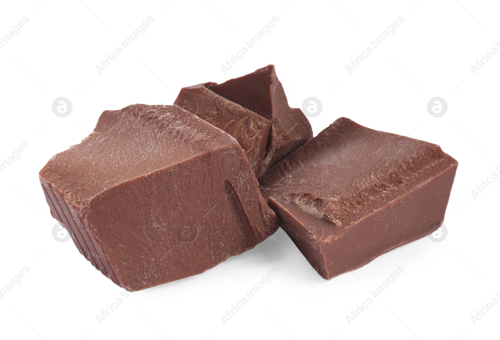 Photo of Pieces of tasty milk chocolate isolated on white