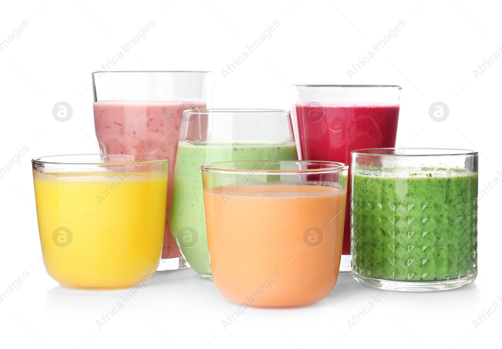 Photo of Glasses with delicious detox smoothies on white background