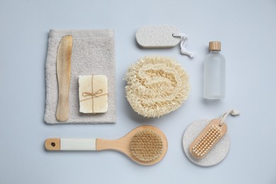 Photo of Bath accessories. Flat lay composition with personal care products on grey background