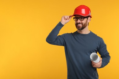 Photo of Architect in hard hat holding draft on orange background, space for text
