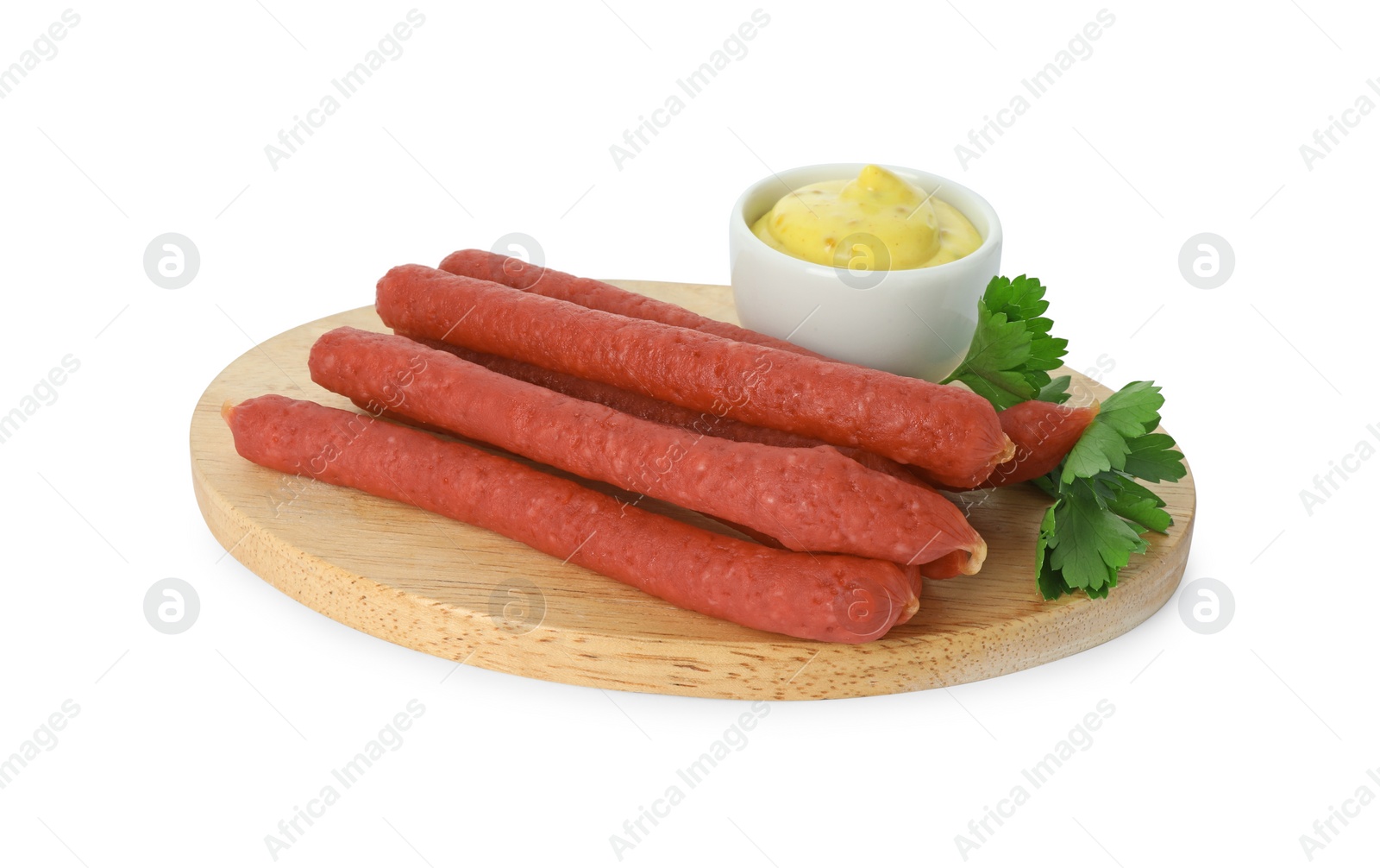 Photo of Thin dry smoked sausages, parsley and sauce isolated on white