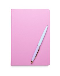 Photo of Closed pink office notebook and pen isolated on white, top view