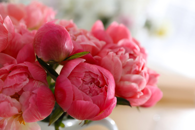 Photo of Beautiful peony bouquet on blurred background, closeup