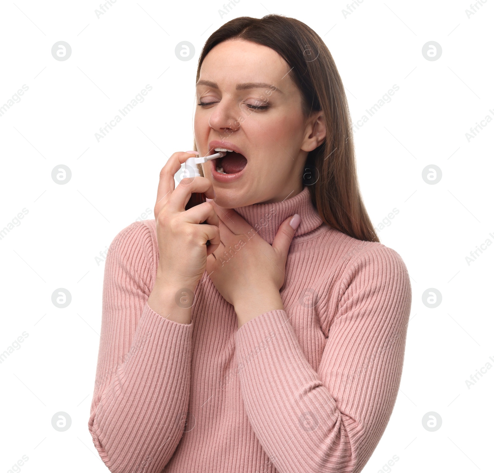 Photo of Woman using throat spray on white background