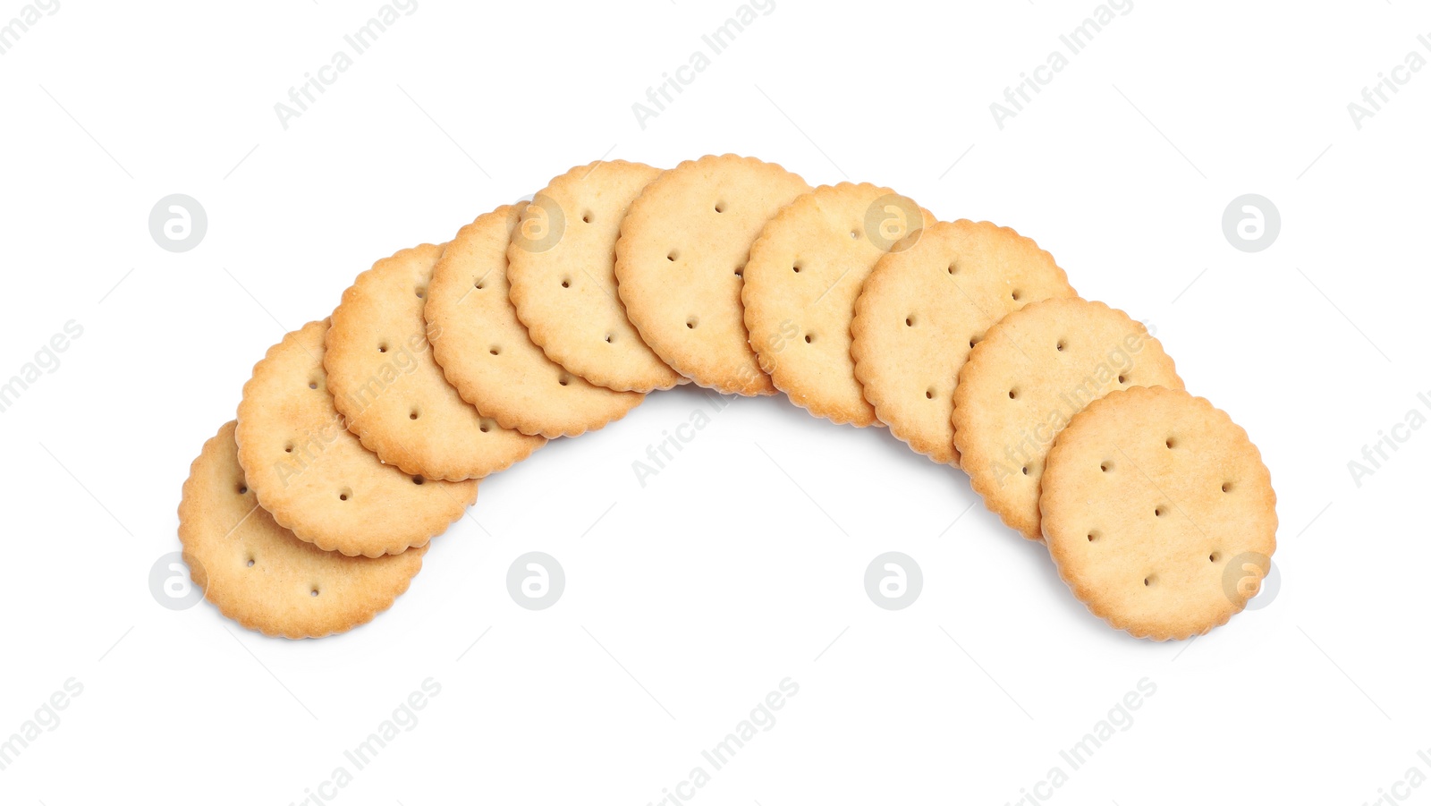 Photo of Tasty crispy round crackers isolated on white, top view