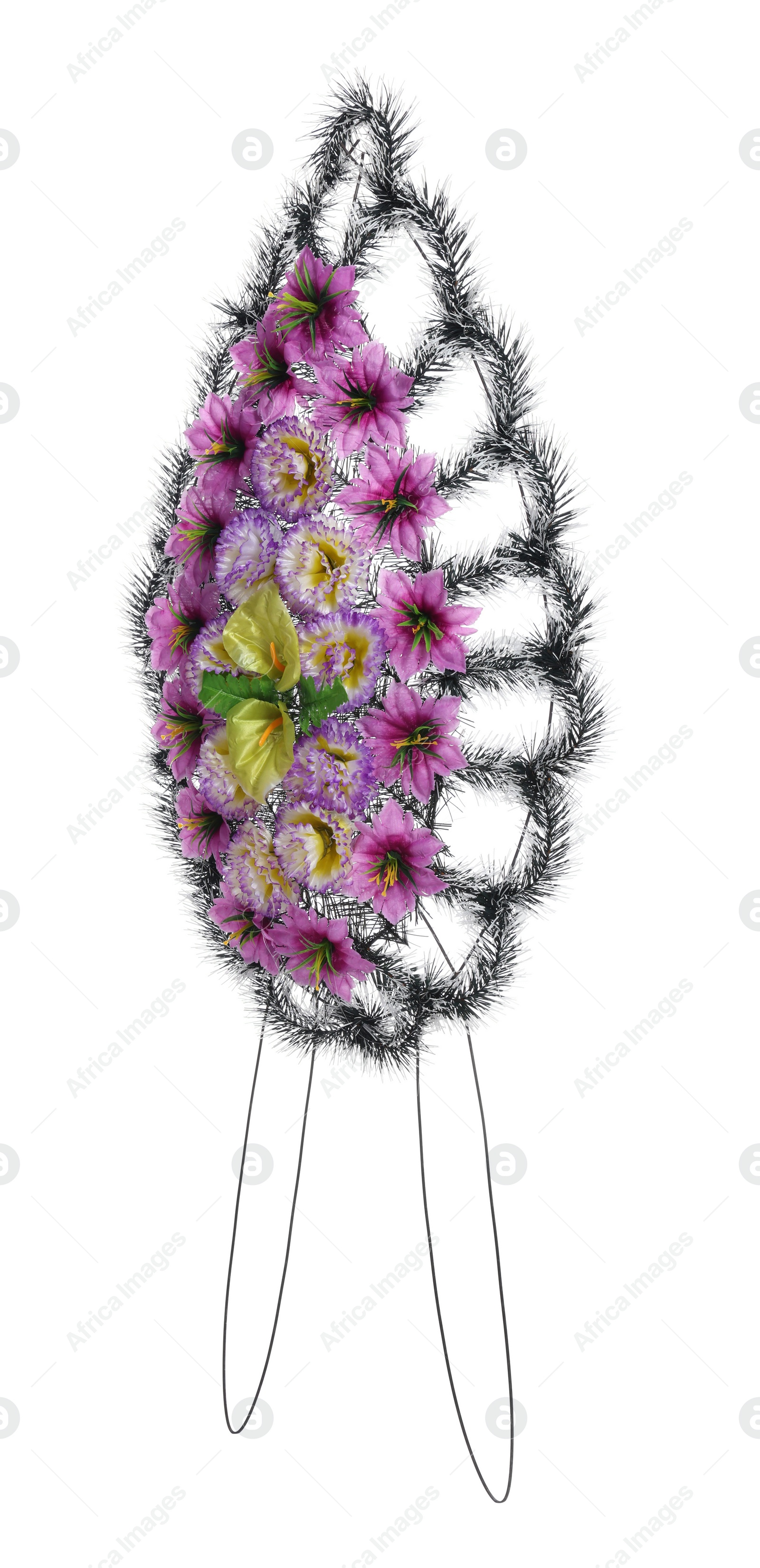 Photo of Funeral wreath of plastic flowers against white background