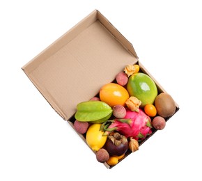 Cardboard box with different exotic fruits on white background, top view