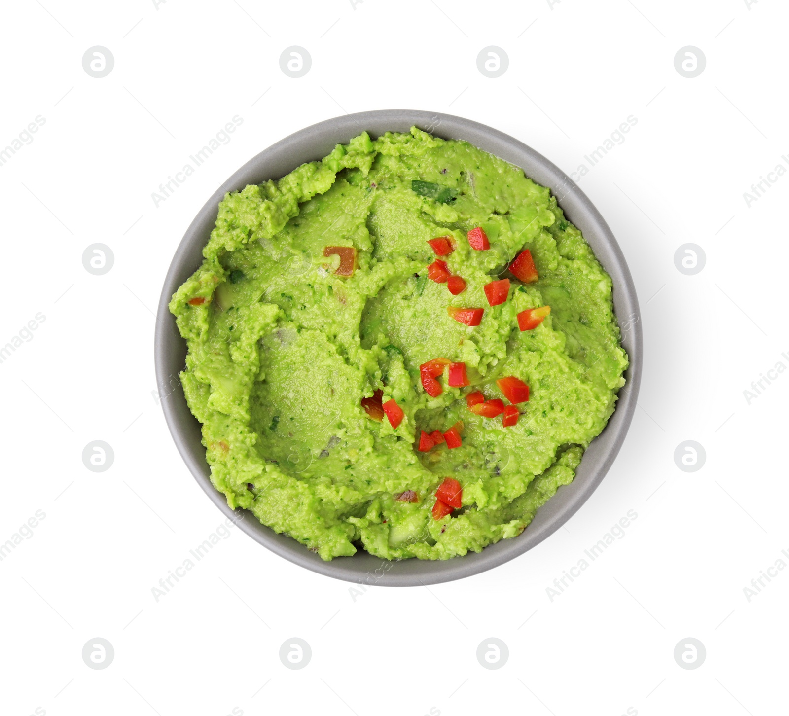 Photo of Bowl of delicious guacamole isolated on white, top view